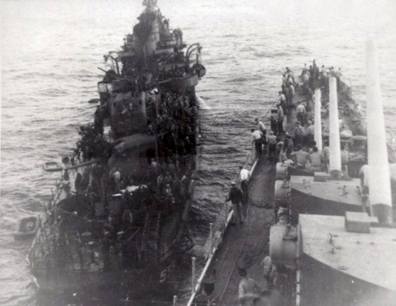 USS_Haggard_(DD-555)_is_assisted_by_USS_San_Diego_(CL-53),_after_being_hit_by_a_kamikaze_off_Okinawa_on_29_April_1945.jpg